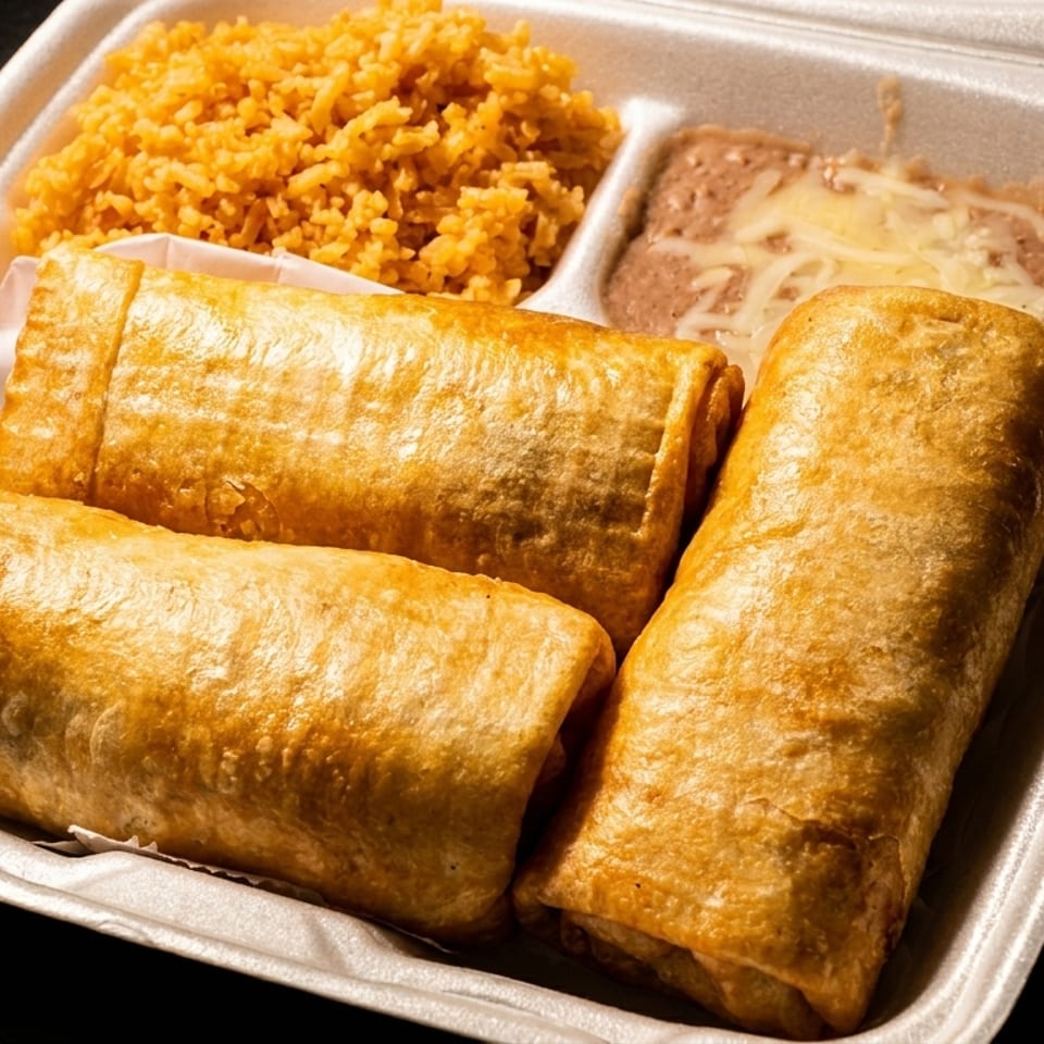 Three golden-brown chimichangas with rice and refried beans in a white takeout container.